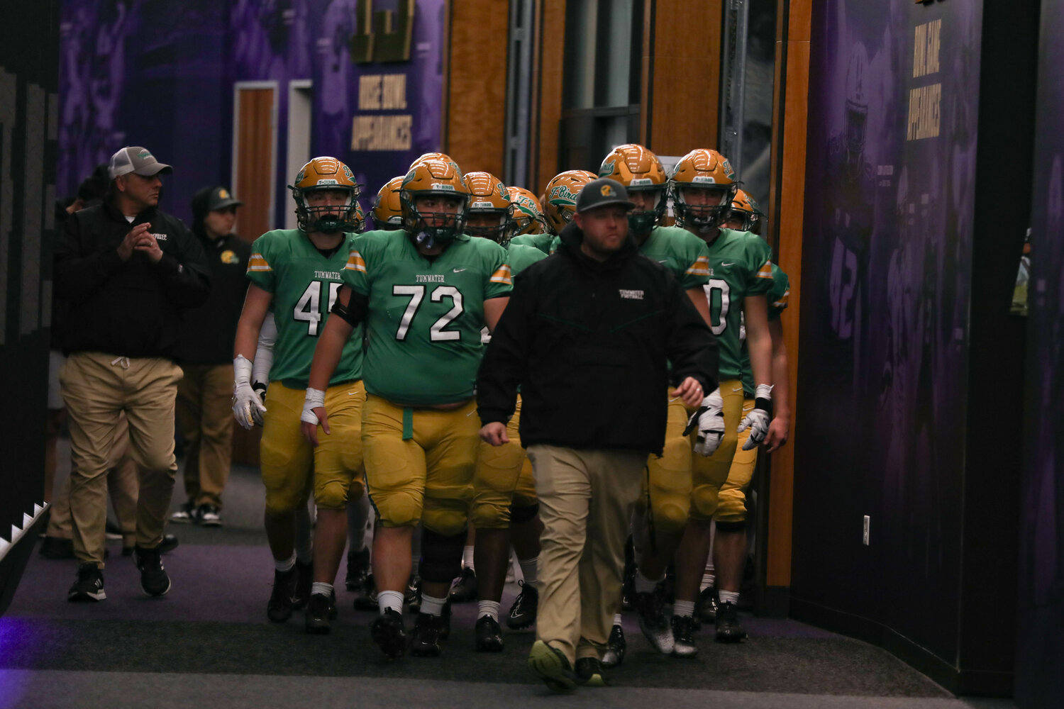 Tumwater players make their way to the field  during a 60-30 loss to Anacortes Dec. 2. at Husky Stadium.